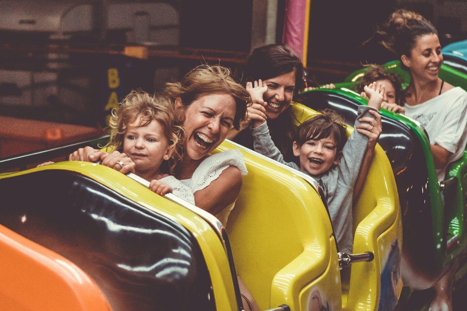 A family laughing together on a ride