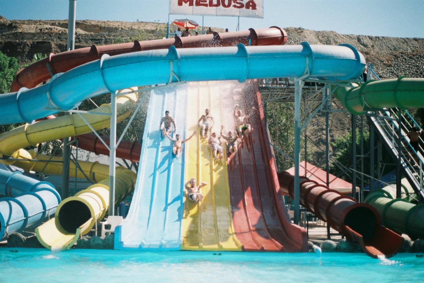 Side-by-side racing slides